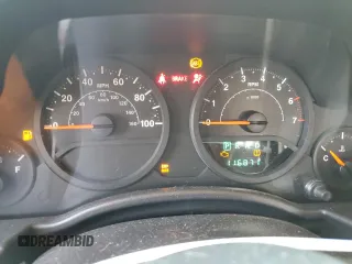 2009 Jeep Wrangler X z VIN 1J4FA24179L716499, wystawiony jako Copart lot #58342675 z przebiegiem 116 871 mil mil oraz Szkoda całkowita • Salvage title. Historia ofert i sprzedaży dostępna na DreamBid. Obrazek 9.