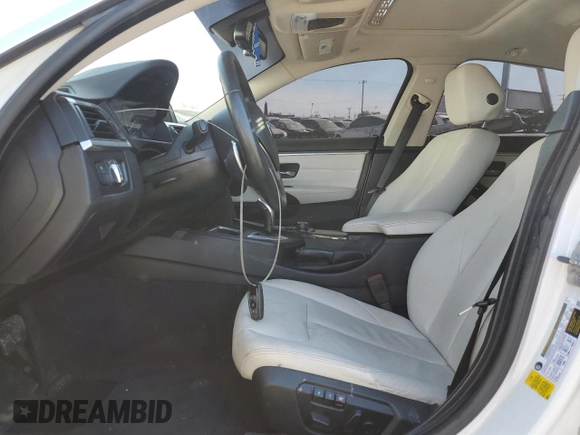 2015 BMW 4 Series 428i with VIN WBA4A9C58FGL85220, listed as a Copart auction lot 57128265 with 115,257 mi miles and Salvage title. Bid and sale history available at DreamBid. Image 7.