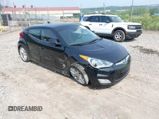 2012 Hyundai Veloster w/Black Int with VIN KMHTC6ADXCU053810, listed as a IAAI auction lot 42502090 with 40,368 mi miles and . Bid and sale history available at DreamBid. Image 1.