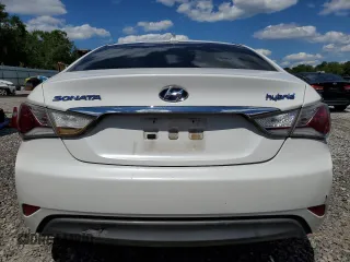 2012 Hyundai Sonata Hybrid z VIN KMHEC4A43CA059186, wystawiony jako Copart lot #55575405 z przebiegiem 217 801 mil mil oraz Szkoda całkowita • Salvage title. Historia ofert i sprzedaży dostępna na DreamBid. Obrazek 6.