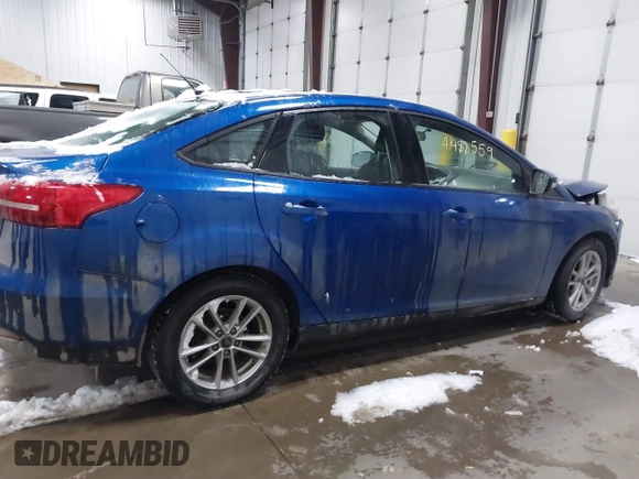 2018 Ford Focus SE z VIN 1FADP3F26JL312725, wystawiony jako IAAI lot #41488559 z przebiegiem 30 686 mil mil oraz . Historia ofert i sprzedaży dostępna na DreamBid. Obrazek 13.
