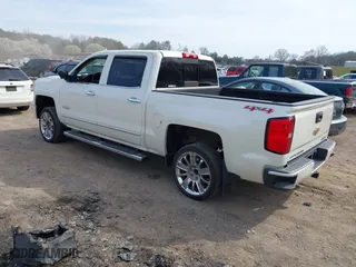 2015 Chevrolet Silverado 1500 High Country with VIN 3GCUKTEC7FG205805, listed as a IAAI auction lot 41815859 with 130,028 mi miles. Bid and sale history available at carsss.com. Image 3.