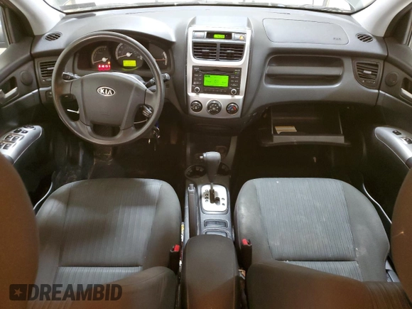 2009 Kia Sportage LX with VIN KNDJE723X97561560, listed as a Copart auction lot 49766995 with 130,623 mi miles and Salvage Title. Bid and sale history available at DreamBid. Image 8.