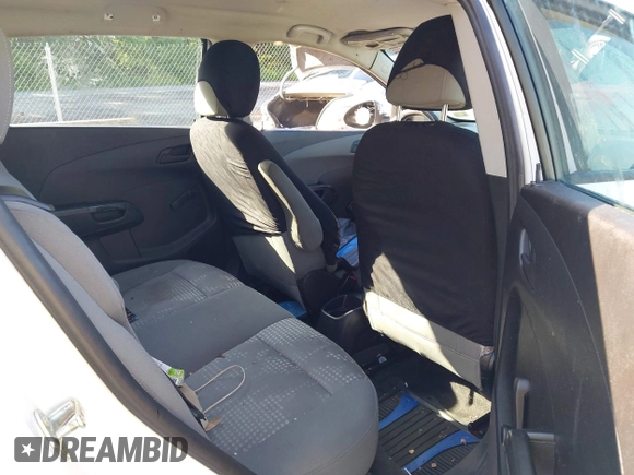 2015 Chevrolet Sonic LS with VIN 1G1JA6SG8F4131976, listed as a IAAI auction lot 42552157 with 99,575 mi miles and . Bid and sale history available at DreamBid. Image 8.