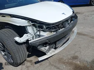 2018 Tesla Model 3 Long Range Battery with VIN 5YJ3E1EAXJF108781, listed as a IAAI auction lot 41962628 with 61,208 mi miles and . Bid and sale history available at DreamBid. Image 20.