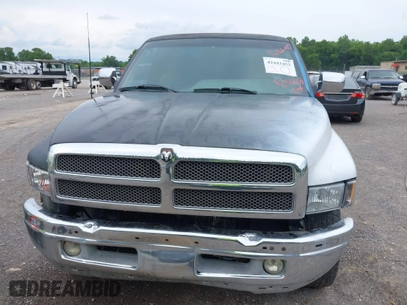 1996 Dodge 1500 z VIN 3B7HC13Y6TG180182, wystawiony jako IAAI lot #42443453 z przebiegiem 224 613 mil mil oraz . Historia ofert i sprzedaży dostępna na DreamBid. Obrazek 6.