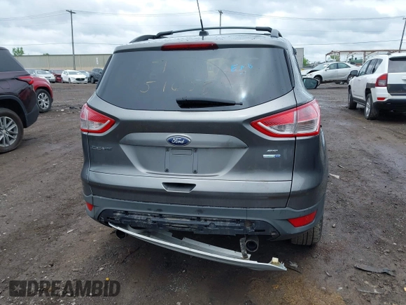 2013 Ford Escape SE with VIN 1FMCU9GX9DUA57901, listed as a IAAI auction lot 42367615 with 140,000 mi miles and . Bid and sale history available at DreamBid. Image 16.