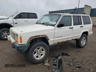2001 Jeep Cherokee Sport z VIN 1J4FF58S21L555876, wystawiony jako Copart lot #87284154 z przebiegiem Nie podano mil oraz Czysty tytuł • Clean title. Historia ofert i sprzedaży dostępna na DreamBid. Obrazek 1.