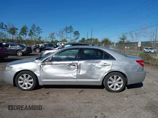 2009 Lincoln MKZ with VIN 3LNHM26T49R603563, listed as a IAAI auction lot 41822110 with 140,504 mi miles and . Bid and sale history available at DreamBid. Image 14.