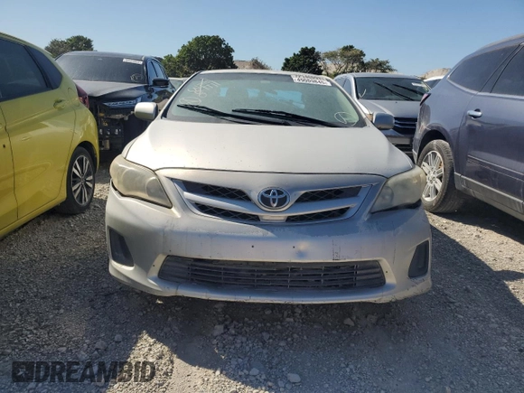 2012 Toyota Corolla L with VIN 2T1BU4EE4CC819483, listed as a Copart auction lot 49009845 with 219,646 mi miles and Non Repairable. Bid and sale history available at carsss.com. Image 5.