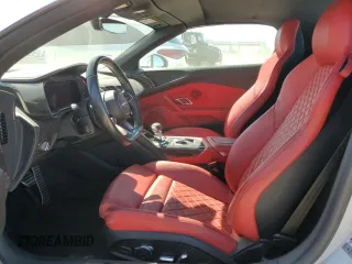 2018 Audi R8 z VIN WUAVACFX1J7900121, wystawiony jako Copart lot #75092964 z przebiegiem Nie podano mil oraz Szkody całkowita. Historia ofert i sprzedaży dostępna na DreamBid. Obrazek 7.
