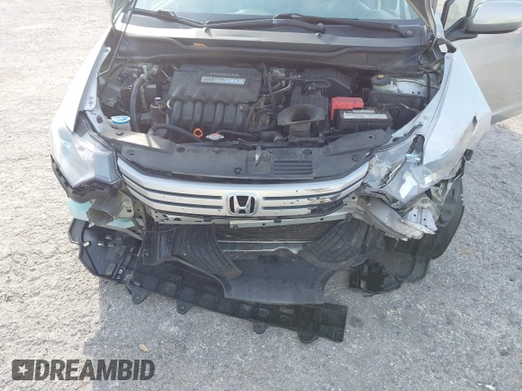 2010 Honda Insight LX with VIN JHMZE2H55AS039854, listed as a IAAI auction lot 42086147 with 153,555 mi miles and . Bid and sale history available at DreamBid. Image 6.