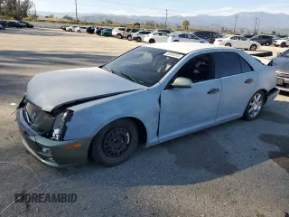 2005 Cadillac STS with VIN 1G6DW677350196094, listed as a Copart auction lot 50595915 with Not Provided miles and Salvage Title. Bid and sale history available at DreamBid. Image 1.