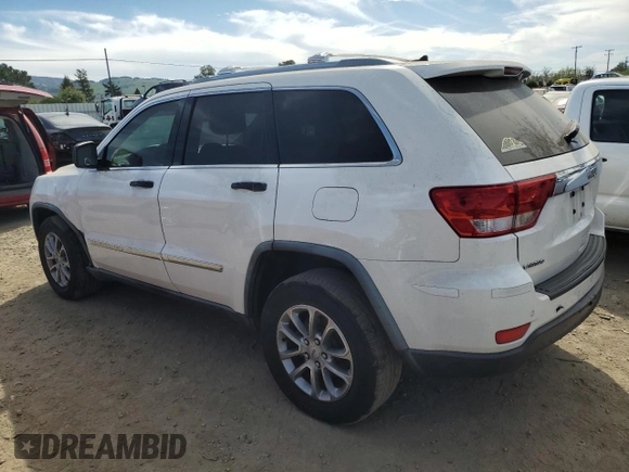 2012 Jeep Grand Cherokee Laredo with VIN 1C4RJEAG0CC222943, listed as a Copart auction lot 52899545 with 153,389 mi miles and Salvage Title. Bid and sale history available at carsss.com. Image 2.