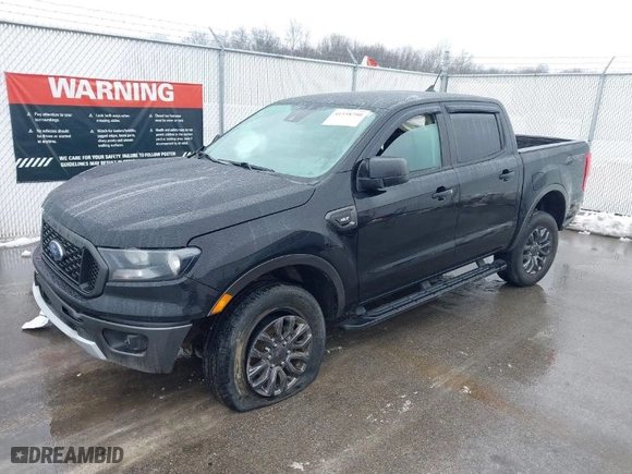 2020 Ford Ranger XL with VIN 1FTER4FH2LLA92828, listed as a IAAI auction lot 41558790 with 64,838 mi miles. Bid and sale history available at carsss.com. Image 2.