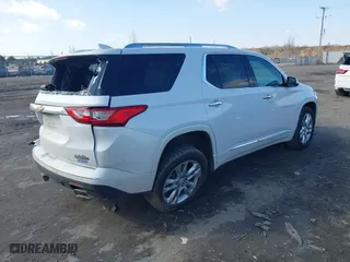 2021 Chevrolet Traverse High Country with VIN 1GNEVNKW9MJ200257, listed as a IAAI auction lot 41545240 with 72,842 mi miles. Bid and sale history available at carsss.com. Image 4.