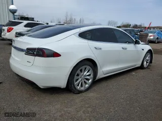 2017 Tesla Model S 100D with VIN 5YJSA1E24HF186757, listed as a Copart auction lot 51511745 with 242,779 mi miles and Salvage Title. Bid and sale history available at carsss.com. Image 3.