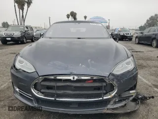 2014 Tesla Model S 60 with VIN 5YJSA1H10EFP60690, listed as a Copart auction lot 62515065 with 57,864 mi miles and Clean title. Bid and sale history available at DreamBid. Image 5.