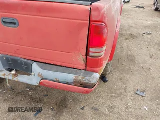 2002 Dodge Dakota Sport with VIN 1B7GL32XX2S558947, listed as a IAAI auction lot 41538339 with 126,150 mi miles. Bid and sale history available at carsss.com. Image 6.
