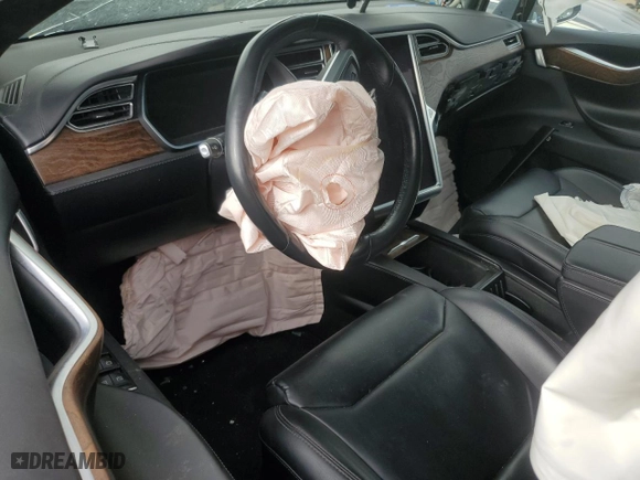 2017 Tesla Model X 90D with VIN 5YJXCDE21HF060258, listed as a Copart auction lot 43822855 with NaN miles and Salvage Title. Bid and sale history available at carsss.com. Image 8.