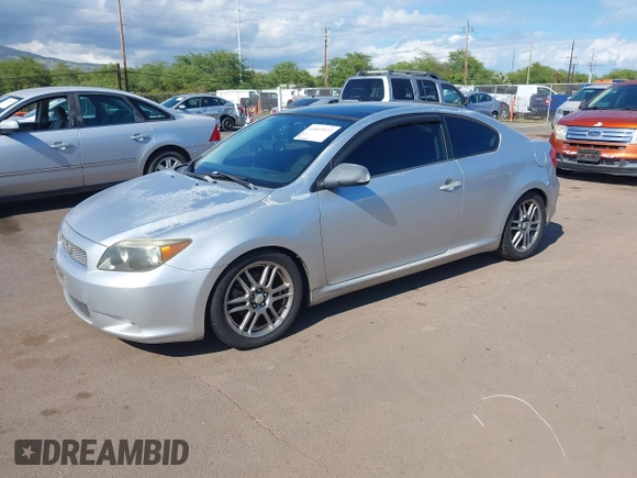 2006 Scion tC with VIN JTKDE177X60088987, listed as a IAAI auction lot 41893922 with 153,282 mi miles. Bid and sale history available at carsss.com. Image 2.