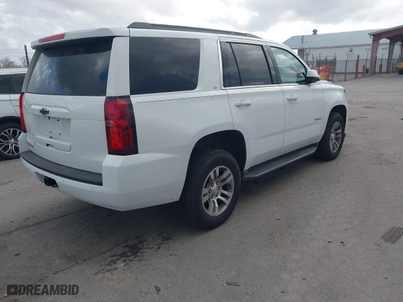 2017 Chevrolet Tahoe LT with VIN 1GNSCBKC0HR238478, listed as a IAAI auction lot 41566679 with 161,086 mi miles. Bid and sale history available at carsss.com. Image 4.
