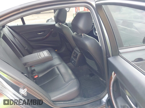 2014 BMW 3 Series 328i xDrive with VIN WBA3B3C55EJ977584, listed as a IAAI auction lot 42805585 with 135,855 mi miles and . Bid and sale history available at DreamBid. Image 8.