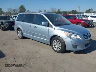2012 Volkswagen Routan SE z VIN 2C4RVABG4CR306993, wystawiony jako IAAI lot #41787241 z przebiegiem 128 834 mil mil oraz . Historia ofert i sprzedaży dostępna na DreamBid. Obrazek 1.