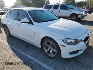 2015 BMW 3 Series 328i with VIN WBA3C1C52FP853191, listed as a Copart auction lot 49509475 with 90,420 mi miles and Salvage title. Bid and sale history available at DreamBid. Image 4.