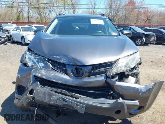 2015 Toyota RAV4 LE with VIN JTMBFREV4FJ037989, listed as a IAAI auction lot 42063957 with 93,201 mi miles and . Bid and sale history available at DreamBid. Image 12.
