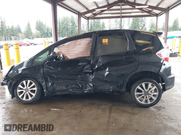 2013 Honda Fit Sport with VIN JHMGE8H57DC033384, listed as a IAAI auction lot 41871356 with 150,777 mi miles. Bid and sale history available at carsss.com. Image 13.