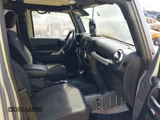 2016 Jeep Wrangler Unlimited Rubicon Hard Rock with VIN 1C4BJWFG6GL265320, listed as a IAAI auction lot 42260151 with Not provided miles and . Bid and sale history available at DreamBid. Image 5.