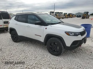 2023 Jeep Compass Trailhawk with VIN 3C4NJDDN2PT570613, listed as a Copart auction lot 53296045 with 14,978 mi miles and Salvage title. Bid and sale history available at DreamBid. Image 4.
