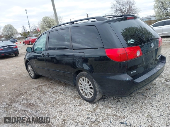 2010 Toyota Sienna XLE with VIN 5TDYK4CC1AS309856, listed as a IAAI auction lot 42089020 with 142,165 mi miles. Bid and sale history available at carsss.com. Image 3.