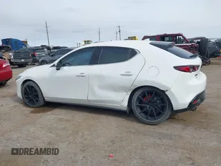 2021 Mazda 3 Premium with VIN JM1BPAML0M1302385, listed as a IAAI auction lot 41397521 with 55,907 mi miles and . Bid and sale history available at DreamBid. Image 13.