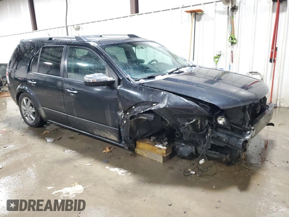 2009 Ford Taurus X Limited z VIN 1FMDK03W89GA00128, wystawiony jako Copart lot #87247904 z przebiegiem 188 844 mil mil oraz Szkoda całkowita • Salvage title. Historia ofert i sprzedaży dostępna na DreamBid. Obrazek 4.