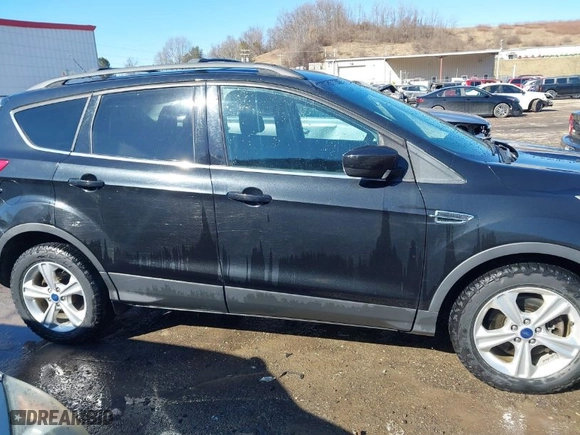 2013 Ford Escape SE with VIN 1FMCU9GX4DUD30453, listed as a IAAI auction lot 41589446 with 130,556 mi miles. Bid and sale history available at carsss.com. Image 13.