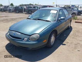 1996 Ford Taurus GL with VIN 1FALP52U3TG139417, listed as a IAAI auction lot 42760633 with 239,490 mi miles and . Bid and sale history available at DreamBid. Image 2.
