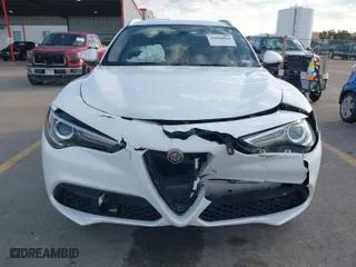 2018 Alfa Romeo Stelvio with VIN ZASFAKANXJ7B73800, listed as a IAAI auction lot 41028864 with 102,518 mi miles. Bid and sale history available at carsss.com. Image 6.