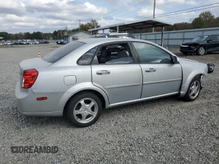 2006 Suzuki Forenza z VIN KL5JD56Z96K362651, wystawiony jako Copart lot #78306894 z przebiegiem 167 916 mil mil oraz Tytuł czysty. Historia ofert i sprzedaży dostępna na DreamBid. Obrazek 3.