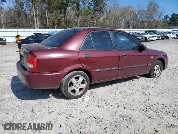 2003 Mazda Protege DX with VIN JM1BJ225030144551, listed as a Copart auction lot 50769905 with 179,876 mi miles and Salvage Title. Bid and sale history available at DreamBid. Image 3.