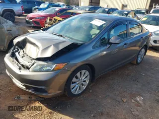 2012 Honda Civic EX with VIN 19XFB2F81CE380880, listed as a IAAI auction lot 41595729 with 118,286 mi miles and . Bid and sale history available at DreamBid. Image 17.