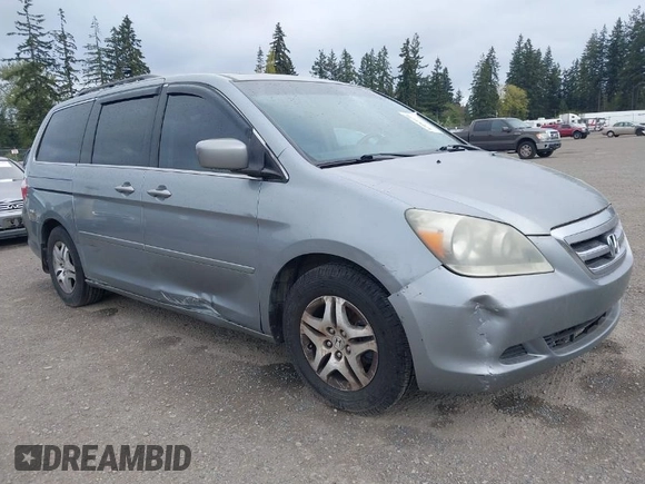2007 Honda Odyssey EX-L with VIN 5FNRL38777B075985, listed as a IAAI auction lot 42083450 with 127,622 mi miles. Bid and sale history available at carsss.com. Image 1.