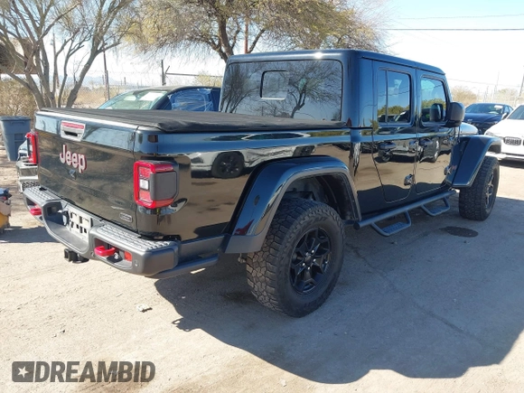 2020 Jeep Gladiator Rubicon z VIN 1C6JJTBG0LL117908, wystawiony jako IAAI lot #41621920 z przebiegiem 61 233 mil mil oraz . Historia ofert i sprzedaży dostępna na DreamBid. Obrazek 4.