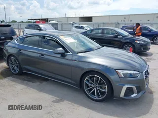 2022 Audi A5 Sportback S line Premium Plus z VIN WAUFACF5XNA009427, wystawiony jako IAAI lot #40203616 z przebiegiem 54 005 mil mil oraz . Historia ofert i sprzedaży dostępna na DreamBid. Obrazek 13.