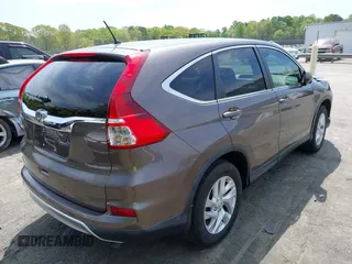 2015 Honda CR-V EX with VIN 2HKRM3H57FH521659, listed as a IAAI auction lot 41876064 with 98,420 mi miles and . Bid and sale history available at carsss.com. Image 4.
