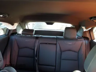 2022 Cadillac XT4 AWD Sport с VIN 1GYFZFR49NF130155, выставлен на аукционе Copart как лот 80286034 с пробегом 28 447 миль миль и Списание • Salvage title. История ставок и продаж доступна на DreamBid. Изображение 10.