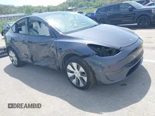 2023 Tesla Model Y Long Range with VIN 7SAYGDEE1PA158661, listed as a IAAI auction lot 41983897 with 20,176 mi miles and . Bid and sale history available at DreamBid. Image 1.