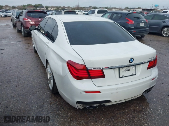 2015 BMW 7 Series 740Li with VIN WBAYE4C54FD947205, listed as a IAAI auction lot 41566291 with 172,729 mi miles and . Bid and sale history available at DreamBid. Image 3.