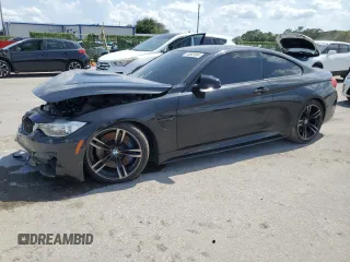2016 BMW M4 with VIN WBS3R9C52GK338151, listed as a Copart auction lot 64882884 with Not Provided miles and Salvage Title. Bid and sale history available at carsss.com. Image 1.